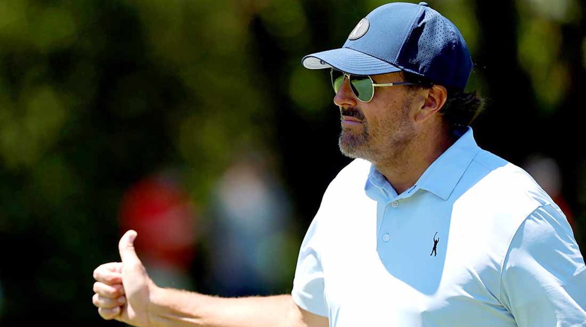 Phil Mickelson acknowledges the crowd at the LIV Golf Invitational at Pumpkin Ridge outside Portland, Oregon.